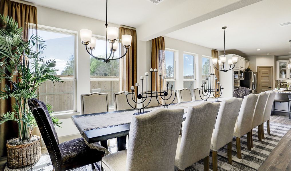 View of dining area and sunroom