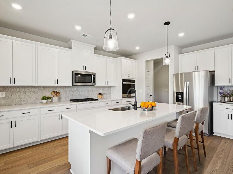 The Taylorsville floorplan with the Divine White interior package.