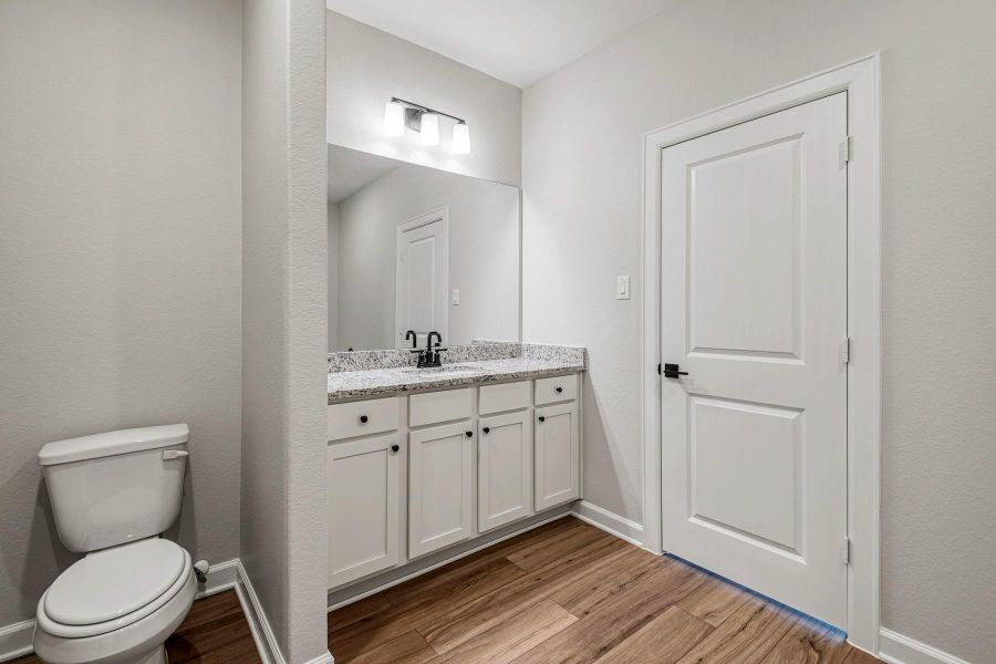 Furnished interior view inside a new home in Sweetwater Ridge, Conroe (Image 8).