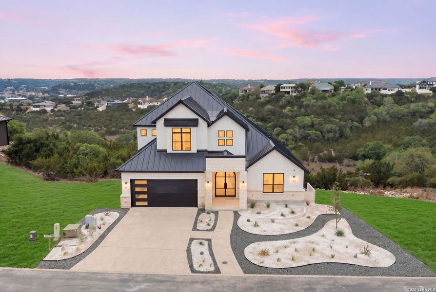 Front exterior of a new home in , Boerne, TX, highlighting curb appeal (Image 27).