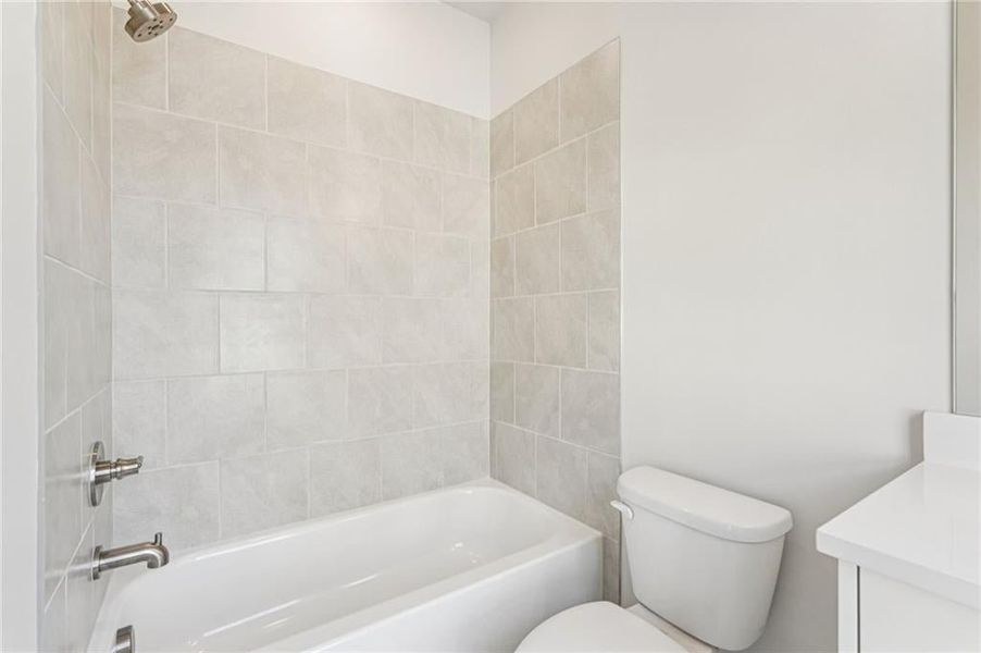 Full bathroom featuring vanity and bathtub / shower combination