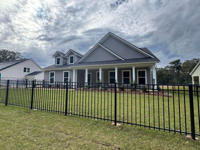 Front exterior of a new home in Central Estates, Summerville, SC, highlighting curb appeal (Image 2).