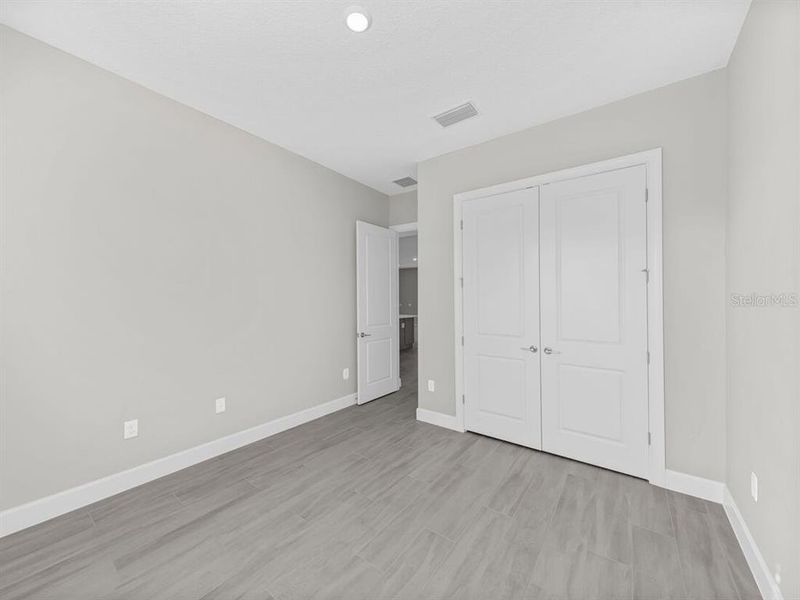 Spacious, unfurnished interior of a new home in Esplanade at Westview, Kissimmee (Image 21). Spacious, unfurnished interior of a new home in Esplanade at Westview, Kissimmee (Image 21).