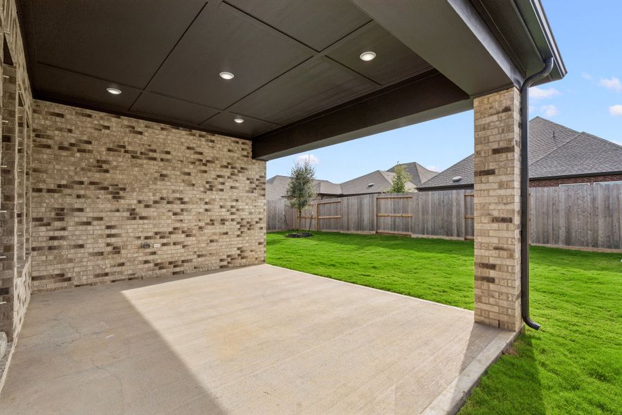 Exterior details and patio area of a home in Riceland - Enclave Collection, Mont Belvieu (Image 3). Exterior details and patio area of a home in Riceland - Enclave Collection, Mont Belvieu (Image 3).