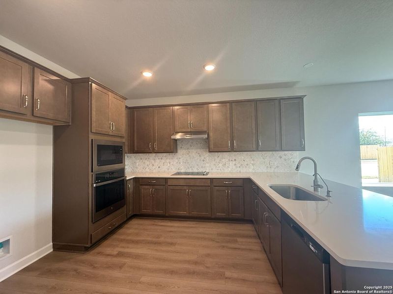 Furnished interior view inside a new home in The Summit at Saddlebrook Ranch 55's, Schertz (Image 12).