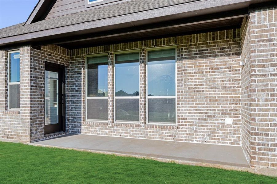Exterior details and patio area of a home in Coyote Crossing, Godley (Image 3). Exterior details and patio area of a home in Coyote Crossing, Godley (Image 3).