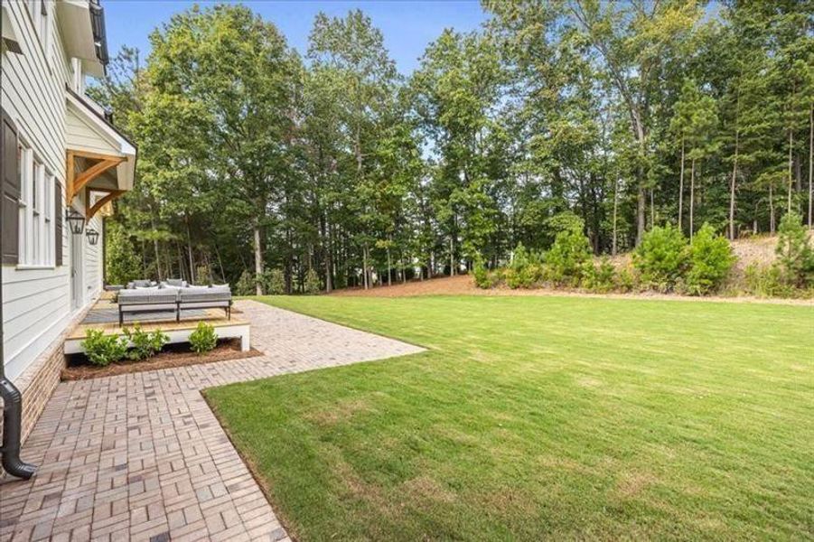 Exterior details and patio area of a home in Crossroads, Alpharetta (Image 26).