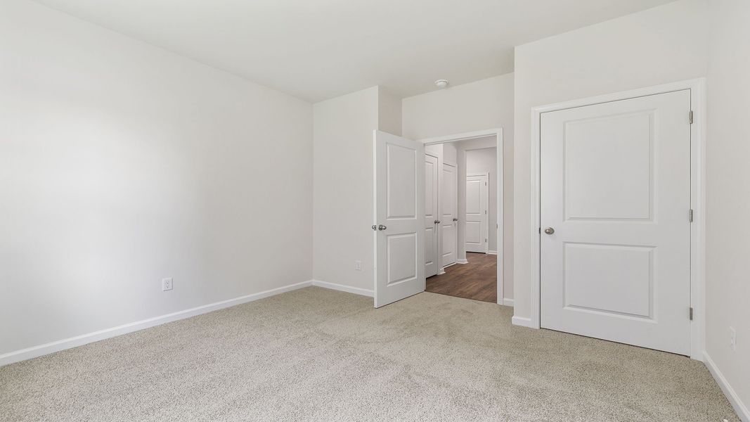 Spacious, unfurnished interior of a new home in Durbin Meadows Traditions, Fountain Inn (Image 19).