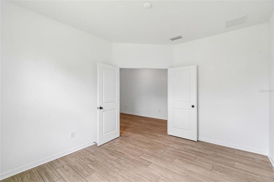 Spacious, unfurnished interior of a new home in Cascades at Southern Hills, Brooksville (Image 57).