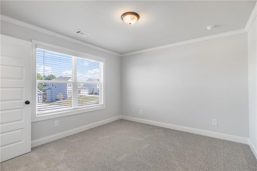Spacious, unfurnished interior of a new home in Calgary Downs, Winder (Image 27).