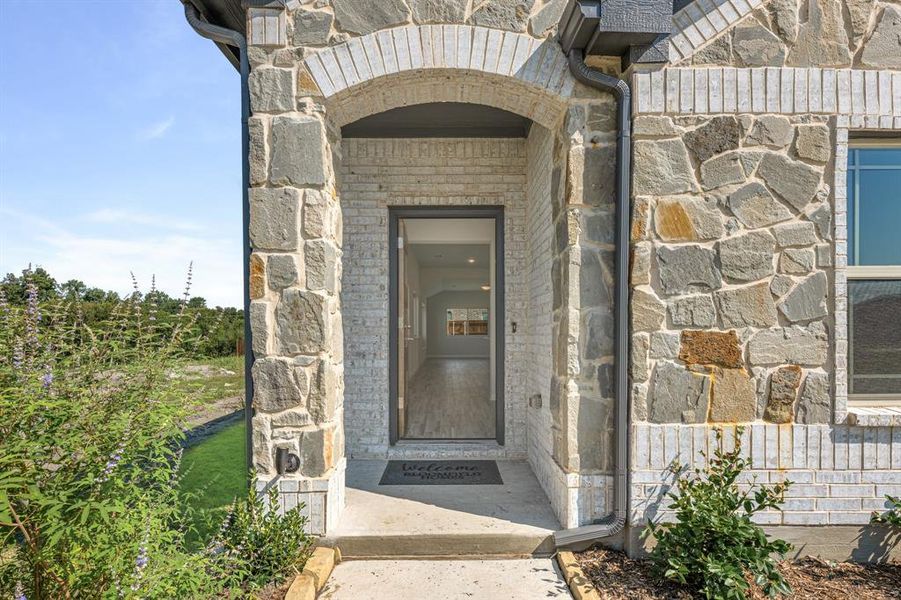 Exterior details and patio area of a home in Bear Creek Elements, Lavon (Image 4).