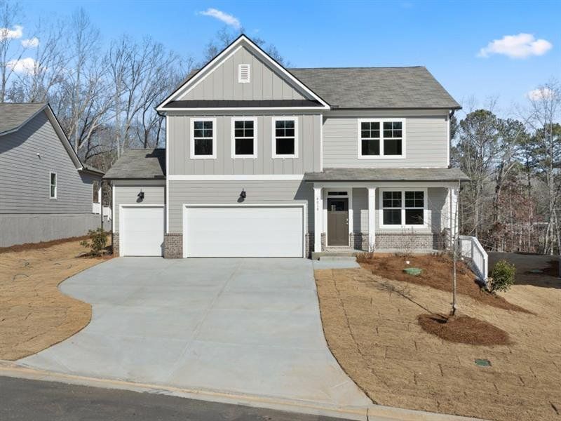 Front exterior of a new home in Falcon Landing, Gainesville, GA, highlighting curb appeal (Image 2).