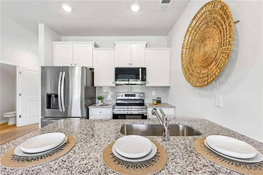 Furnished interior view inside a new home in , Fairburn (Image 8).