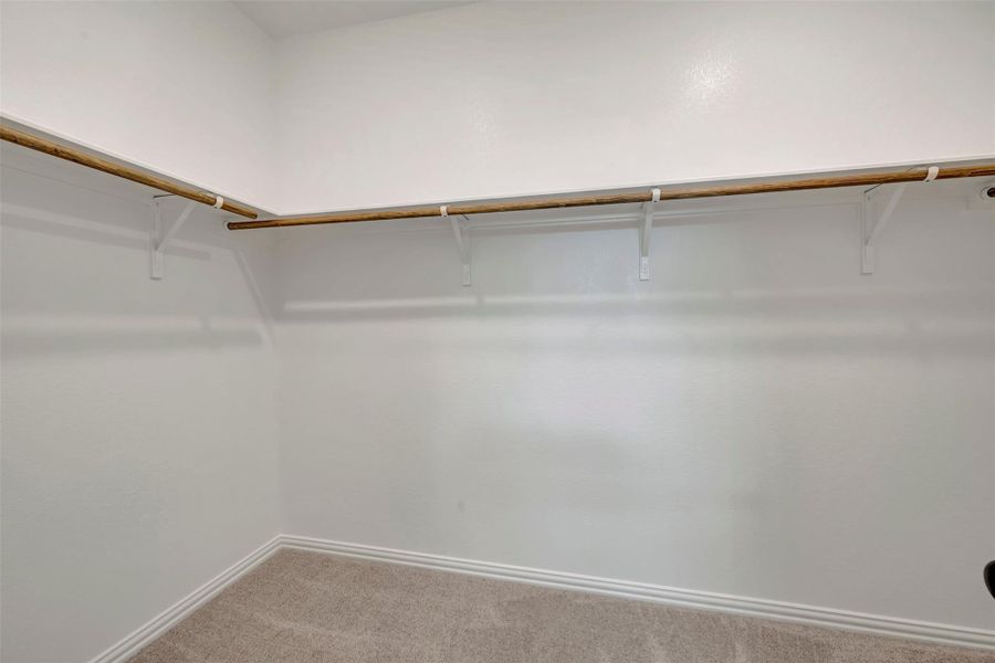 Spacious, unfurnished interior of a new home in Heritage, Dripping Springs (Image 28).