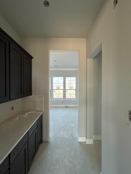 Bathroom featuring concrete floors and vanity