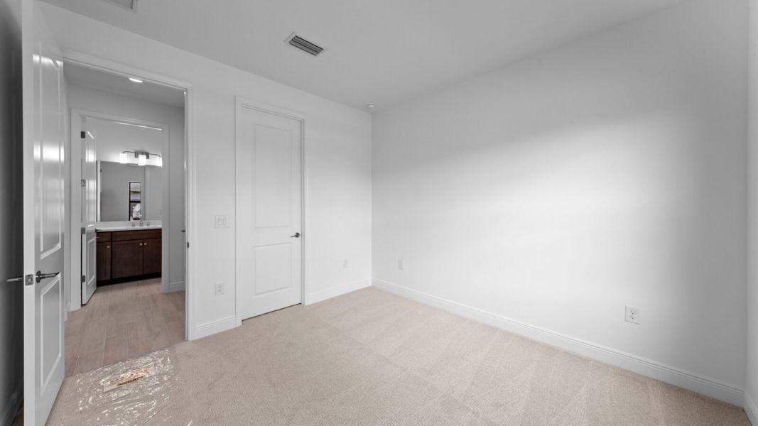 Spacious, unfurnished interior of a new home in SkySail, Naples (Image 31).