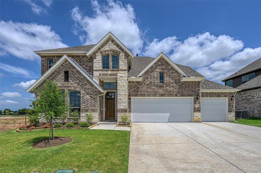 Front exterior of a new home in Stone River Glen, Royse City, TX, highlighting curb appeal (Image 21). Front exterior of a new home in Stone River Glen, Royse City, TX, highlighting curb appeal (Image 21).