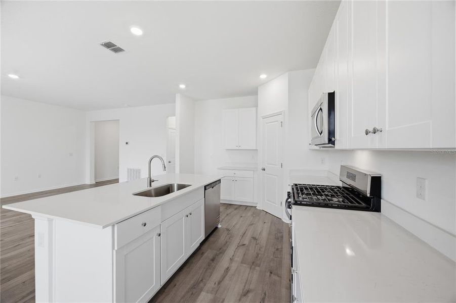 Furnished interior view inside a new home in , Okahumpka (Image 7).
