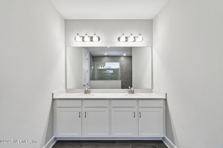 Furnished interior view inside a new home in Tributary 70', Yulee (Image 11).