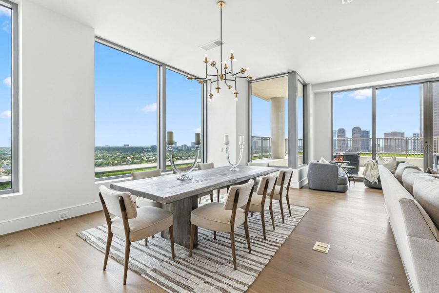 A sophisticated dining space with spectacular views designed for hosting memorable formal gatherings A sophisticated dining space with spectacular views designed for hosting memorable formal gatherings