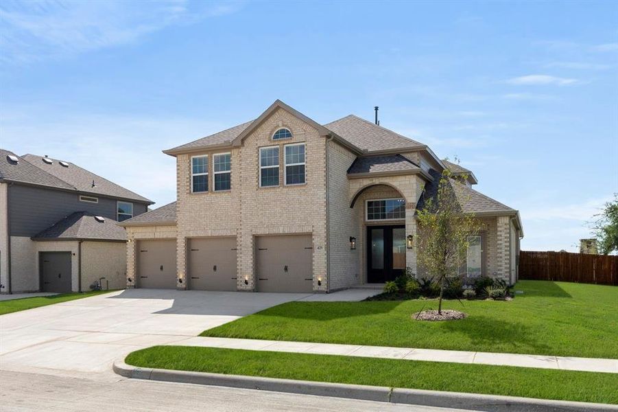 Front exterior of a new home in Woodcreek, Rockwall, TX, highlighting curb appeal (Image 21).