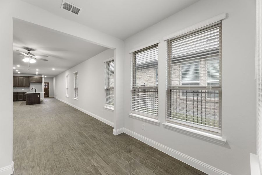 Front exterior of a new home in Redden Farms – Active Adult, Midlothian, TX, highlighting curb appeal (Image 15).