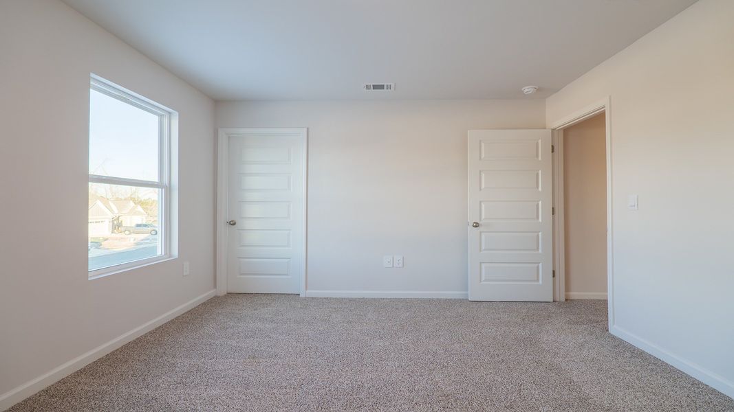 Spacious, unfurnished interior of a new home in Olson Ridge, Tallahassee (Image 22).