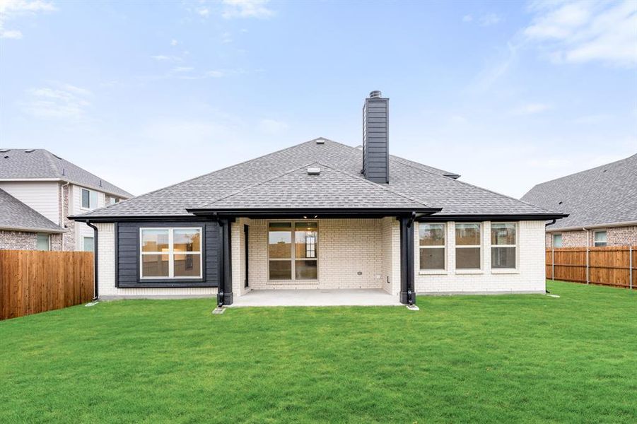 Exterior details and patio area of a home in Villages of Hurricane Creek, Anna (Image 20).