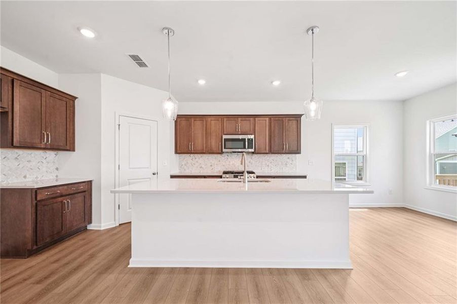 Furnished interior view inside a new home in Eastlyn Crossing, Flowery Branch (Image 6).