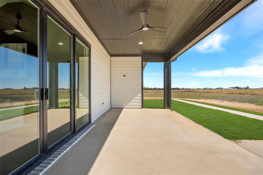 View of patio / terrace with a ceiling fan View of patio / terrace with a ceiling fan
