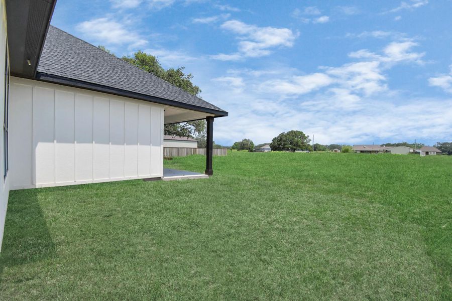 Exterior details and patio area of a home in , Angleton (Image 3).