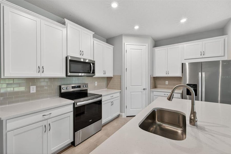 Furnished interior view inside a new home in Windwater, Parrish (Image 16).