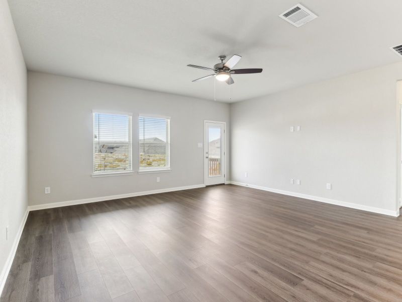 Living room in the Matador floorplan at a Meritage Homes community.