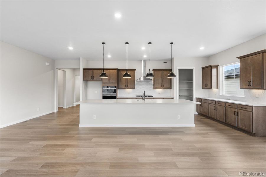 Furnished interior view inside a new home in Hilltop at Inspiration, Aurora (Image 20).