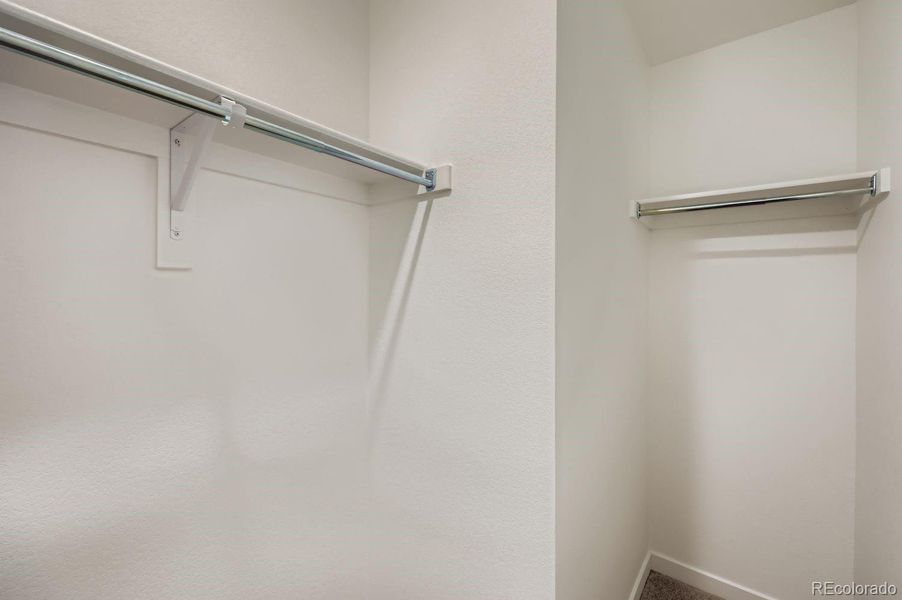 Spacious, unfurnished interior of a new home in Percheron: The Explorer Collection, Colorado Springs (Image 6).