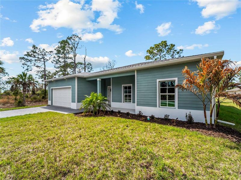 Exterior details and patio area of a home in , North Port (Image 27).