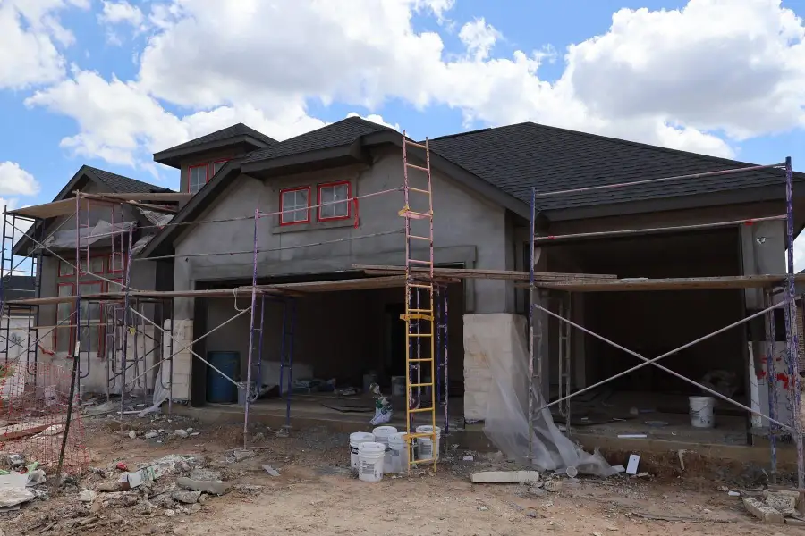 In-progress construction of a new home in Woodson’s Reserve, Spring, TX (Image 4).