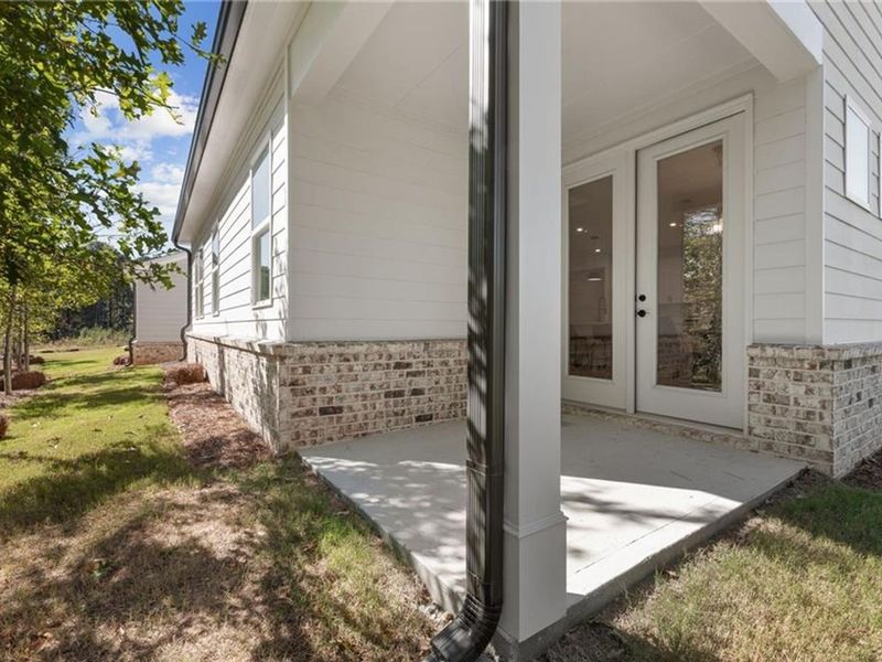Exterior details and patio area of a home in Kelly Preserve, Loganville (Image 3).