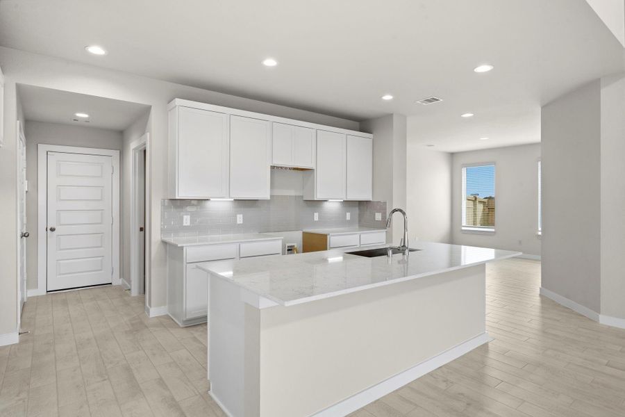 Furnished interior view inside a new home in Sunterra Lakes, Fulshear (Image 7).