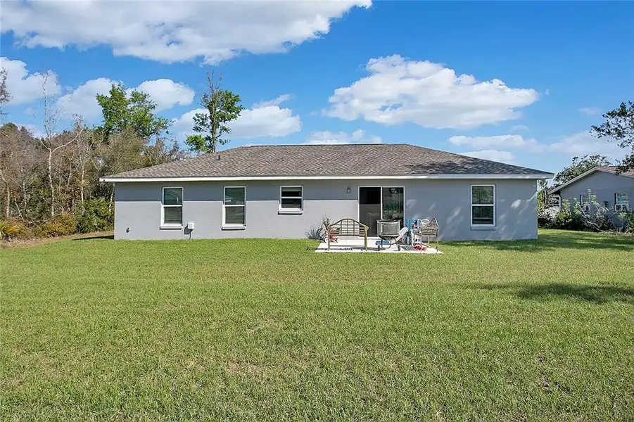 Exterior details and patio area of a home in , Ocala (Image 3).