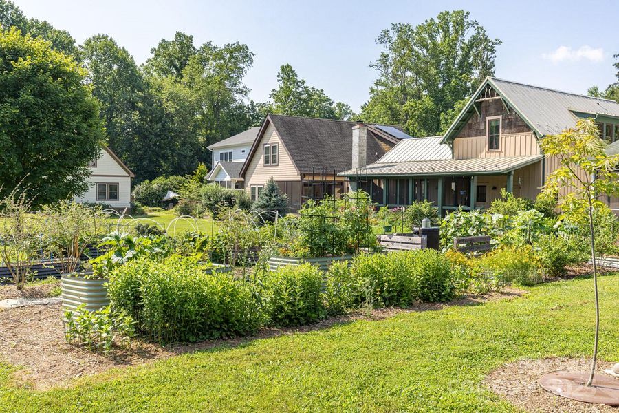 Nestled in a community designed for sustainability, you'll have direct access to walking trails, waterfalls, and over 2 acres of greenspace and community gardens.