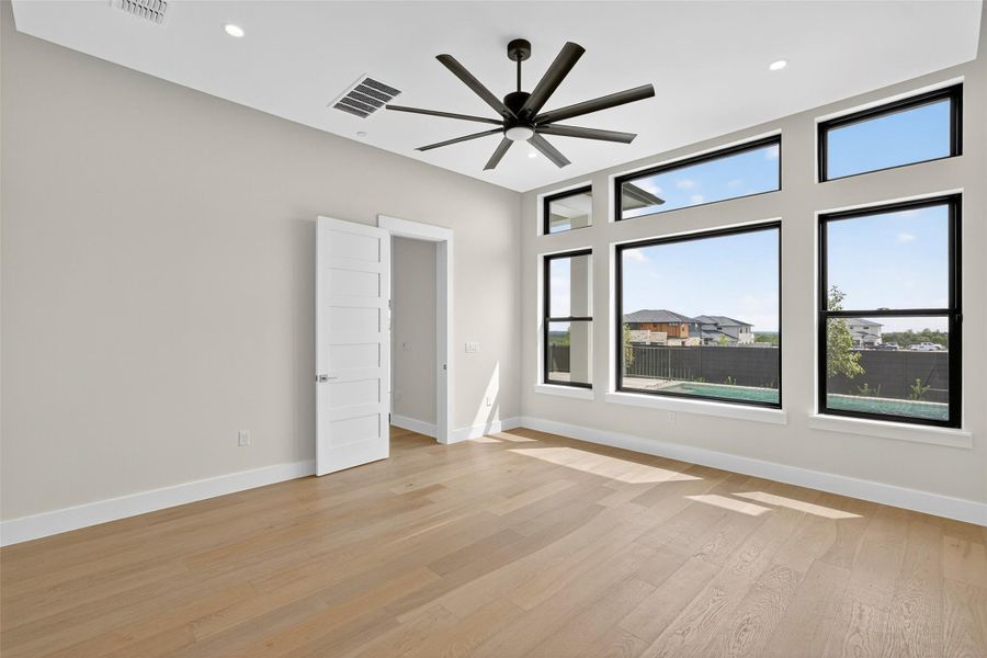 Spacious, unfurnished interior of a new home in Milky Way at River Place, Austin (Image 18).