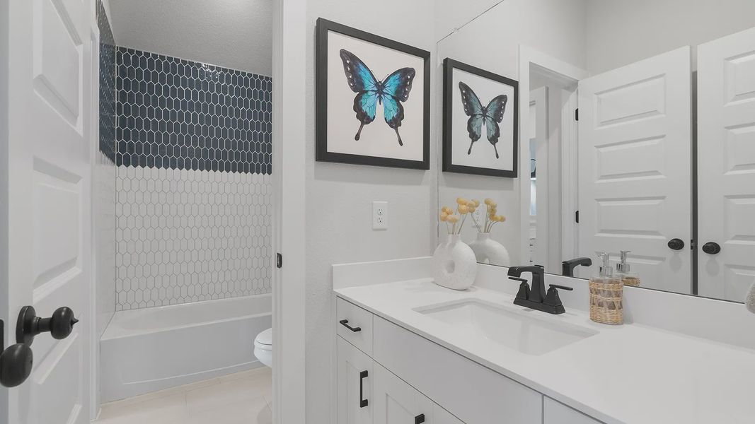 Representative furnished interior of a home built from the Wilson by Chesmar Homes in Lariat, Liberty Hill (Image 22).