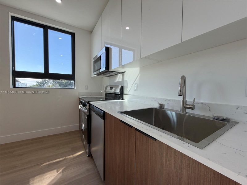 Furnished interior view inside a new home in , Miami (Image 11). Furnished interior view inside a new home in , Miami (Image 11).