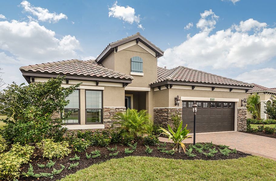 Representative exterior photo of a completed home built from the Sandcastle 2 by Neal Communities in Boca Royale Golf & Country Club at Wellen Park, Englewood, FL (Image 22).