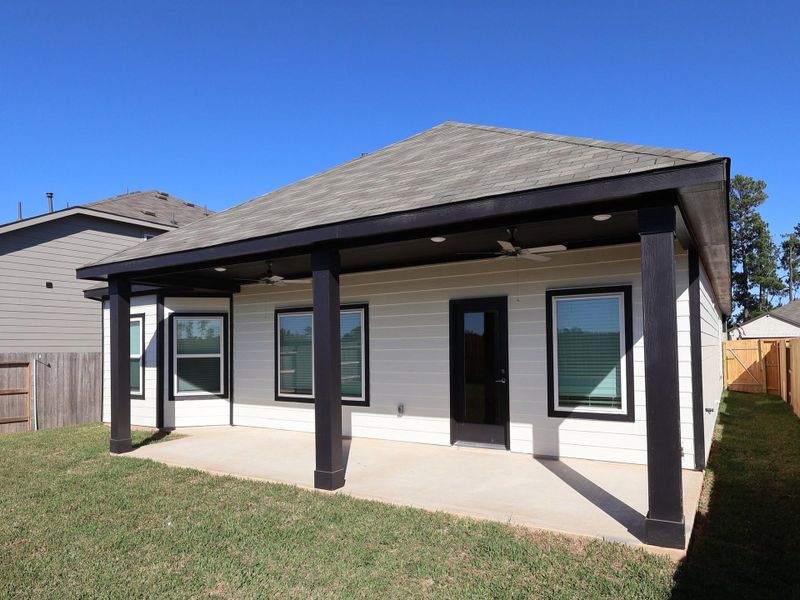 Exterior details and patio area of a home in Moran Ranch, Willis (Image 2).