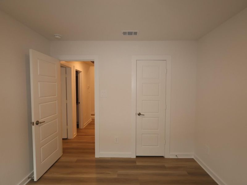 Spacious, unfurnished interior of a new home in Pinewood at Grand Texas, New Caney (Image 19).
