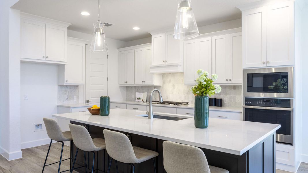 Furnished interior view inside a new home in Santa Rita Ranch Tierra Rosa, Liberty Hill (Image 7). Furnished interior view inside a new home in Santa Rita Ranch Tierra Rosa, Liberty Hill (Image 7).