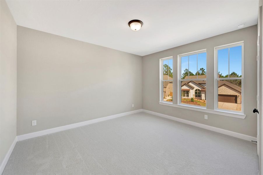 2ndary bedroom.  Blocked and wired and double switched for a fan.  Note large windows!