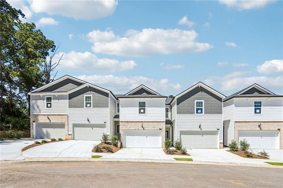 Front exterior of a new home in Artisan Walk, Fairburn, GA, highlighting curb appeal (Image 20).